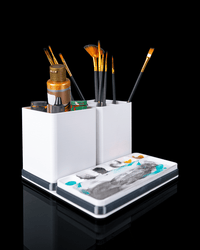 Brush caddy with paints and palette