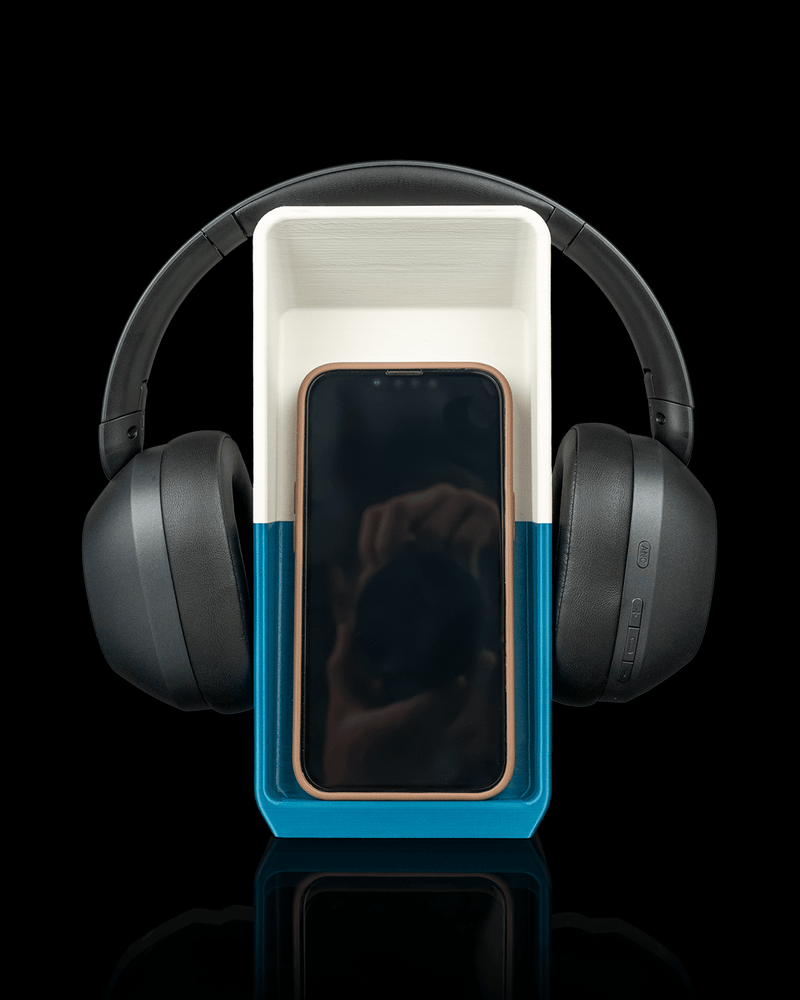 Block Hub holding a phone and headphones