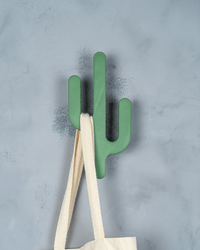 Desert Hook cactus wall hanger holding bags in an entryway