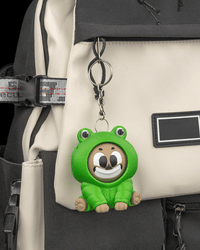 Froggybara clipped to a backpack as a keychain