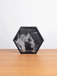 Hexagon halftone frame leaning on a table
