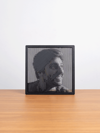 Square halftone frame on a shelf