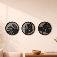 Three round halftone frames on a wall