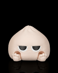 Meh Dumplin clicker fidget toy with an unbothered face