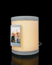 Memo Tower lamp holding a photo and notes