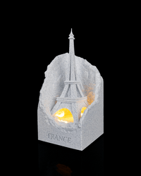 Eiffel Tower night light angled view