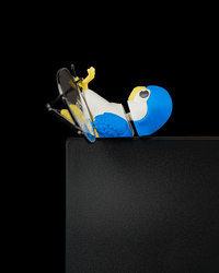 Perchmate glasses stand on a desk edge