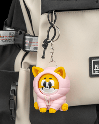 Puffer Corgi clipped to a bag as a keychain