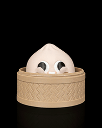 Smiley dumpling fidget in a bamboo steamer basket