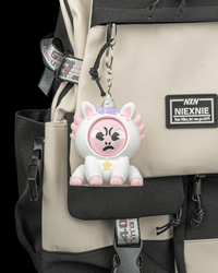 Uni-Lotl clipped to a bag as a keychain